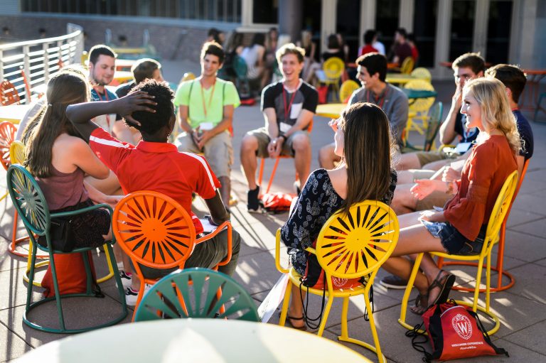 New students sit outside of Union South.