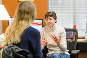 A Cross-College Advising Service (CCAS) advisor meets with a student during an advising session in Ogg Hall.