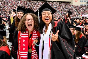 UW graduates celebrate at spring commencement at Camp Randall Stadium.