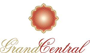 grand central logo with the name of the apartment in cursive and a mandala design above it.