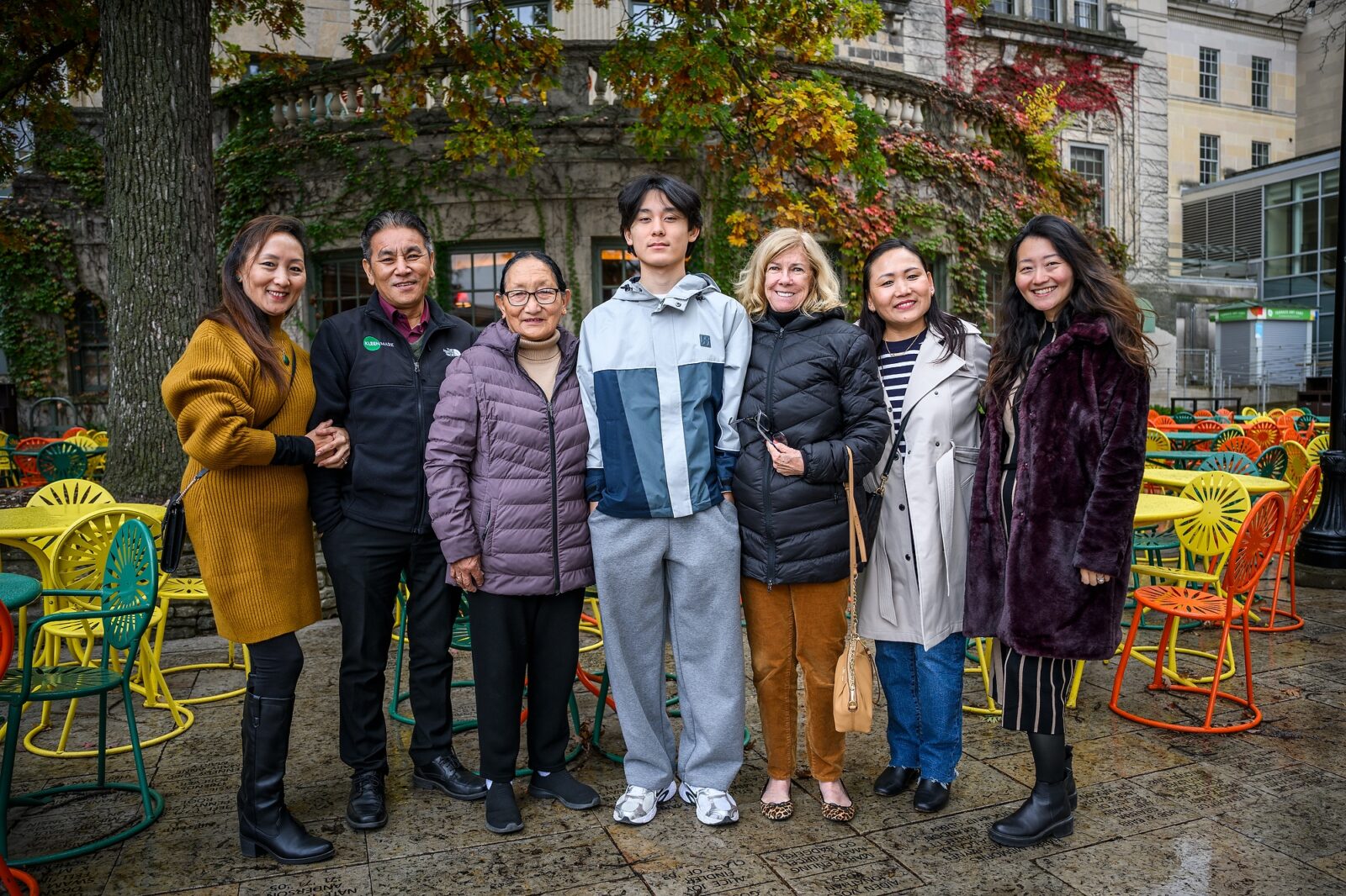 At right, Tsering Thillman, communications manager with Student Affairs, poses for a photo with her family including her cousin at center.
