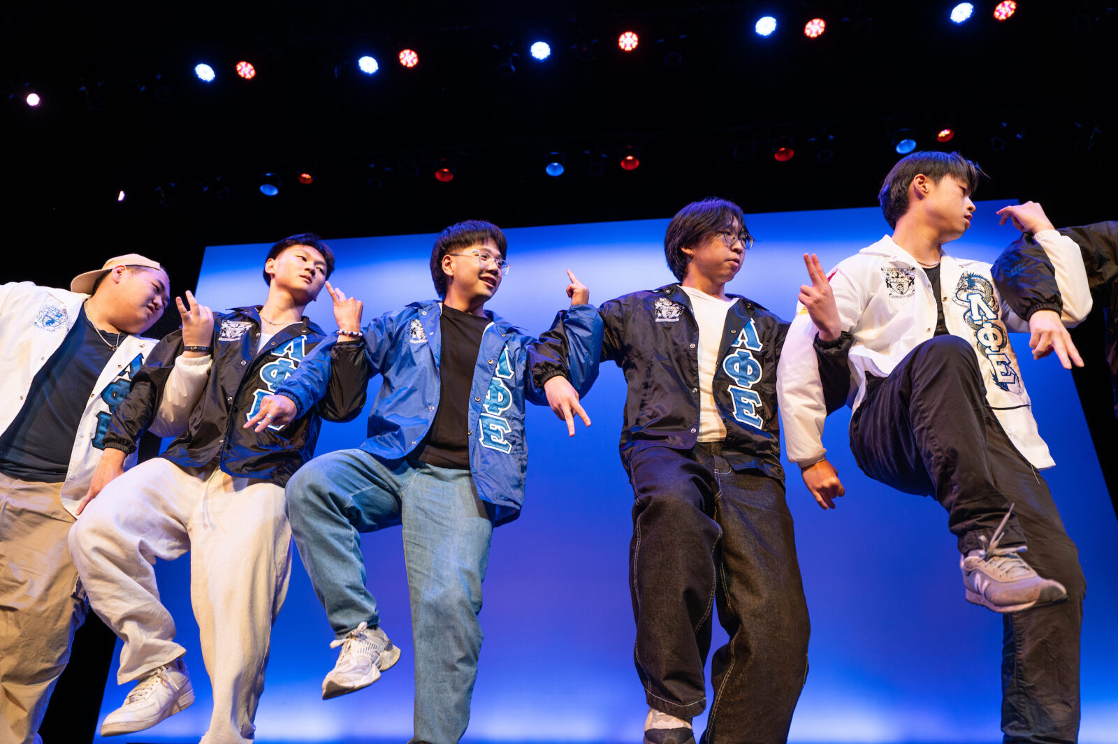 Members of Lambda Phi Epsilon International Fraternity, Inc., an Asian-interest fraternity, stroll during the Multicultural Orientation and Reception (MCOR)