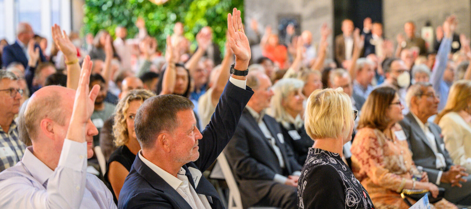 People raising their hand