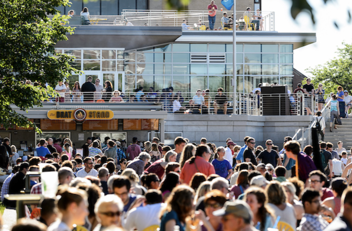 Hundreds of people shown gathered on the Memorial Union terrace. 
